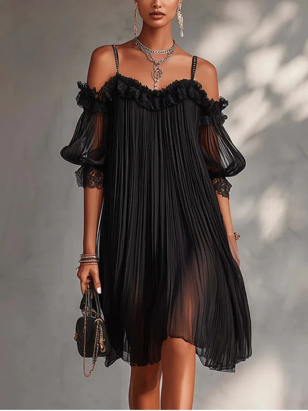 LYA | VESTIDO DE ENCAJE NEGRO CON MANGAS ABULLONADAS